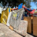 Migrantes reconstruyen campamento en la Venustiano Carranza tras desalojo