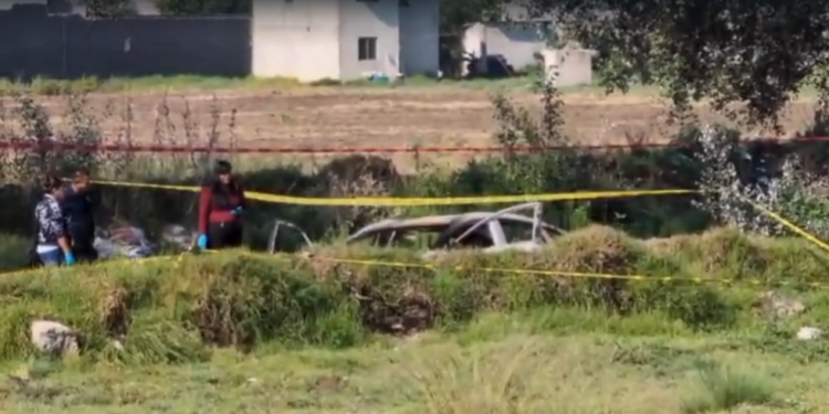 Investigan hallazgo de cuerpo dentro de auto incendiado en Amozoc
