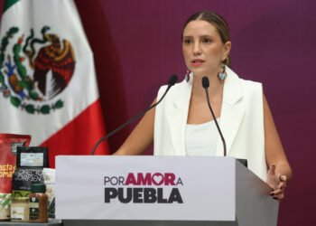 Secretaria de Turismo de Puebla aparece en evento privado en España